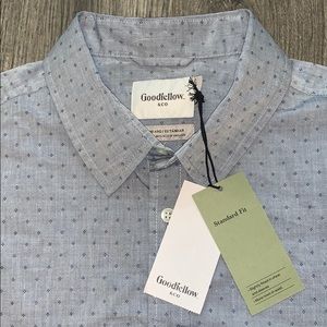 Casual button down, short sleeve shirt.